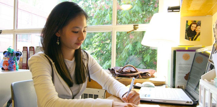 Female student studying in her residence hall