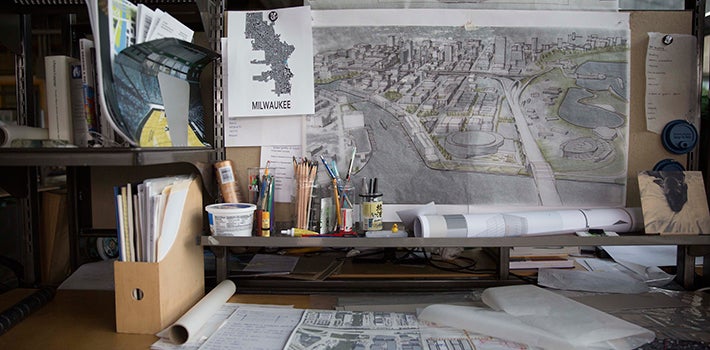 Landscape Map Landscape architecture student's desk with drawings and materials on it