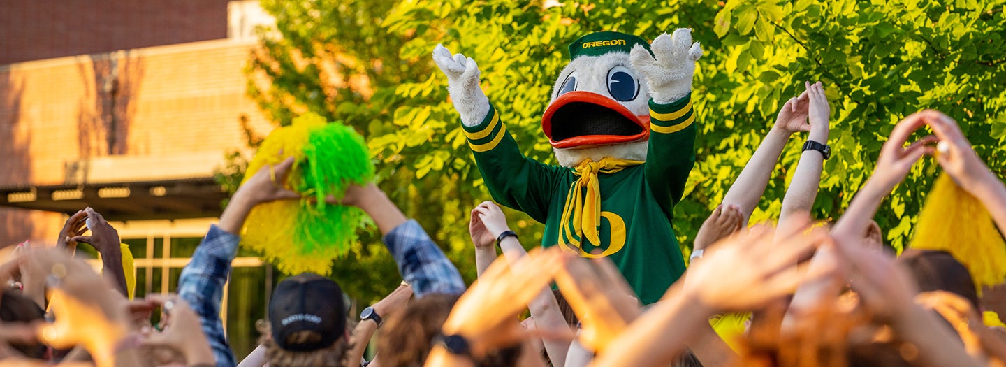 Become a Duck The Duck leads students in a cheer
