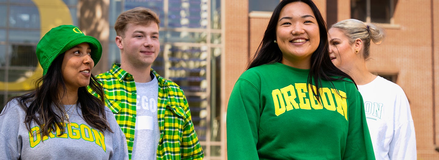 Students walking in front of a building.